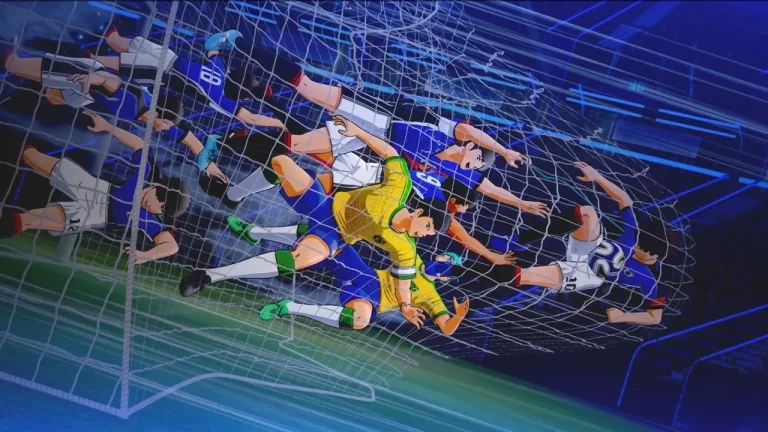 Captain Tsubasa II World Fighters Switch NSP Players in blue and yellow kits are pushed into the goal net by a powerful shot