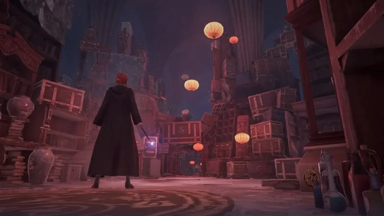 Hogwarts Legacy Deluxe Edition Switch NSP player exploring ruins with wand and floating lanterns