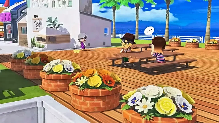 Tomodachi Life: Living the Dream Switch NSP Miis relaxing at an outdoor seaside area