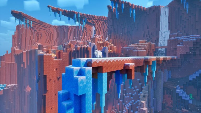 Minecraft Dungeons II Switch NSP Blocky red canyon with a snowy ledge, blue ice spikes, a waterfall, and a white goat standing on a cliff